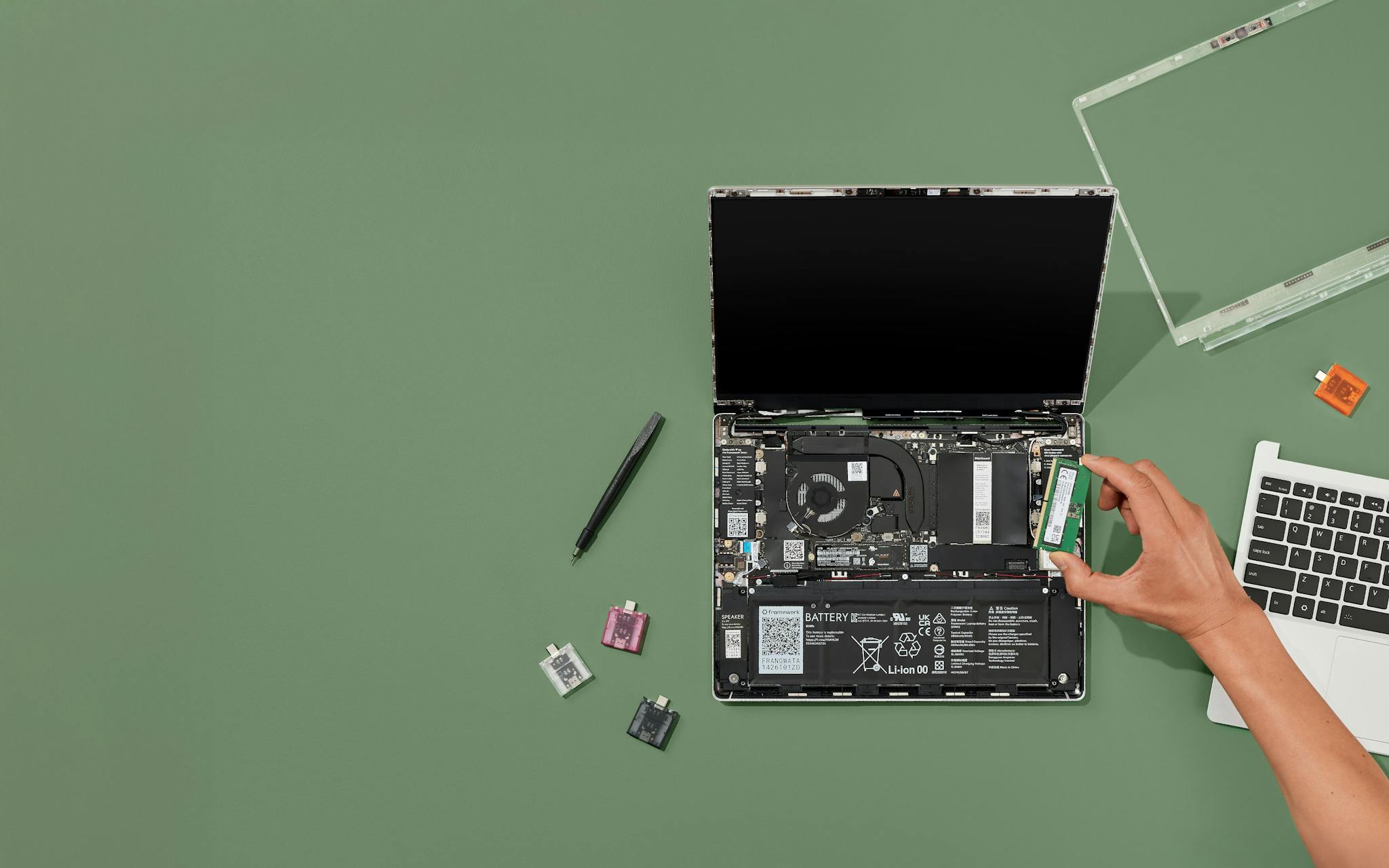 Framework Laptop 13 in silver, open at an angle showing its 3:2 display